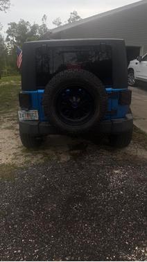 Blue 2015 Jeep Wrangler Unlimited Sport