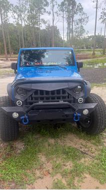 Blue 2015 Jeep Wrangler Unlimited Sport