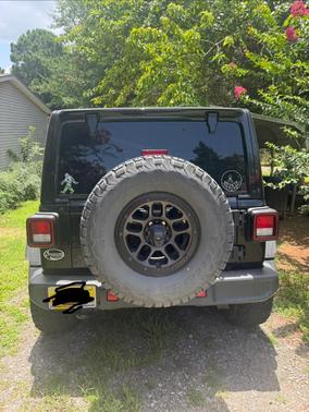Black 2023 Jeep Wrangler High Tide