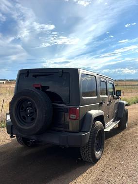 Black 2016 Jeep Wrangler Unlimited Sport