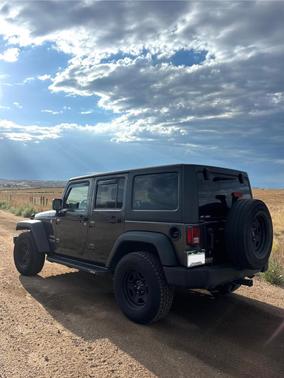 Black 2016 Jeep Wrangler Unlimited Sport