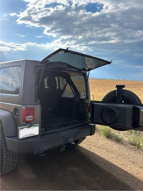 Black 2016 Jeep Wrangler Unlimited Sport