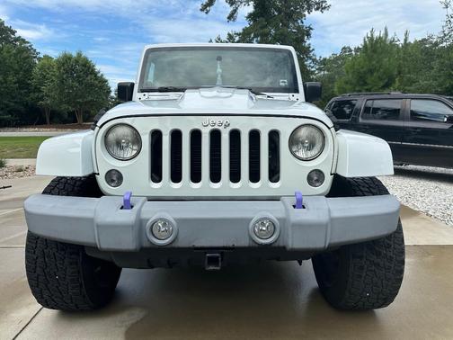 White 2014 Jeep Wrangler Unlimited Sport