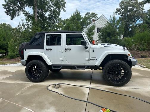 White 2014 Jeep Wrangler Unlimited Sport