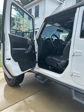 White 2014 Jeep Wrangler Unlimited Sport