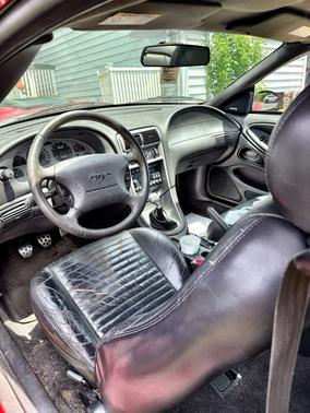 Red 2004 Ford Mustang Mach I