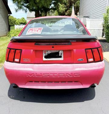 Red 2004 Ford Mustang Mach I