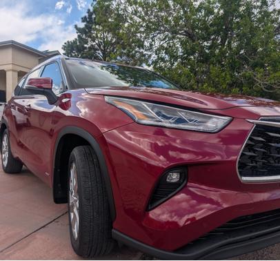 Red 2026 Toyota Highlander Hybrid Limited