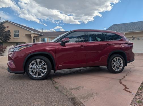 Red 2026 Toyota Highlander Hybrid Limited