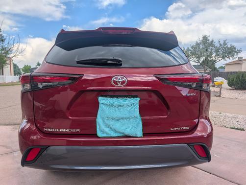 Red 2026 Toyota Highlander Hybrid Limited