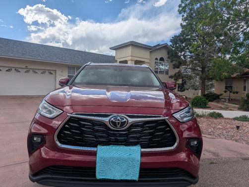 Red 2026 Toyota Highlander Hybrid Limited