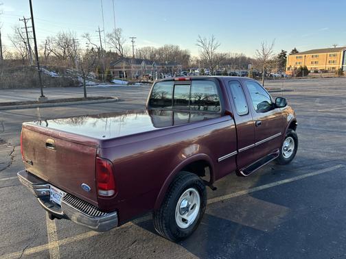 Red 1997 Ford F-150 Lariat SuperCab
