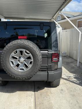 Gray 2014 Jeep Wrangler Unlimited Sport