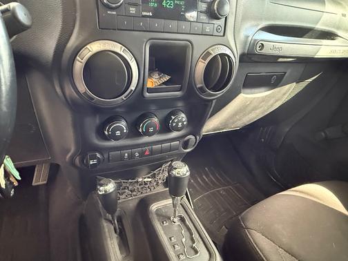 Gray 2014 Jeep Wrangler Unlimited Sport