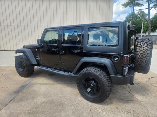 Black 2016 Jeep Wrangler Unlimited Sport