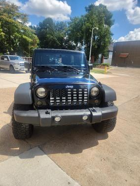 Black 2016 Jeep Wrangler Unlimited Sport