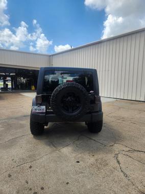 Black 2016 Jeep Wrangler Unlimited Sport