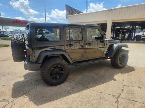 Black 2016 Jeep Wrangler Unlimited Sport