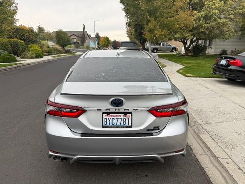 Silver 2021 Toyota Camry Hybrid SE