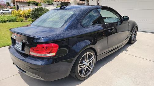 Blue 2013 BMW 135 is