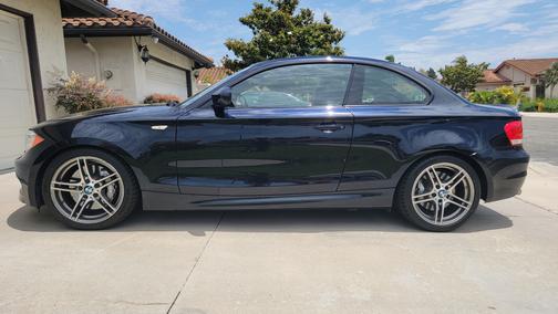 Blue 2013 BMW 135 is