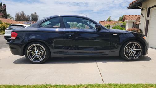 Blue 2013 BMW 135 is