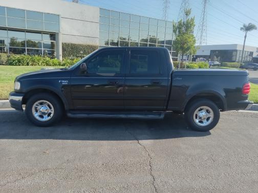 Black 2001 Ford F-150 Lariat SuperCrew