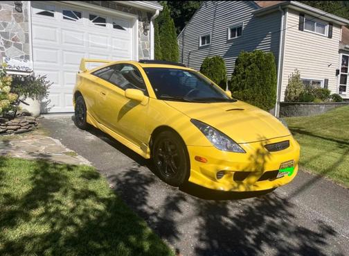 Yellow 2003 Toyota Celica GT