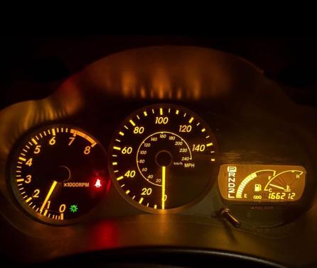 Yellow 2003 Toyota Celica GT