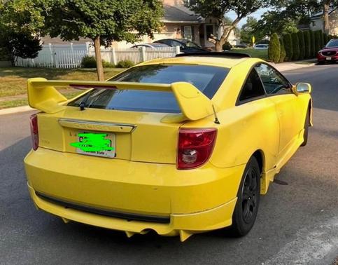 Yellow 2003 Toyota Celica GT