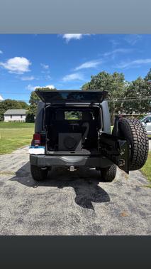 Black 2014 Jeep Wrangler Sport