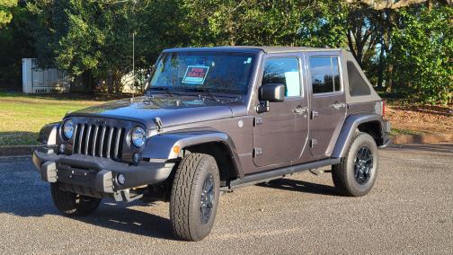 Photo 2 of 9 of 2016 Jeep Wrangler Unlimited Sahara