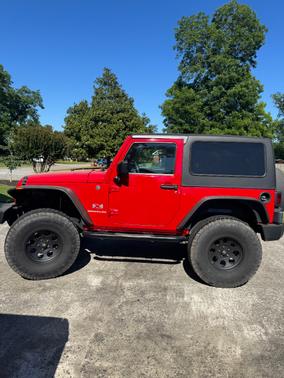Red 2009 Jeep Wrangler X