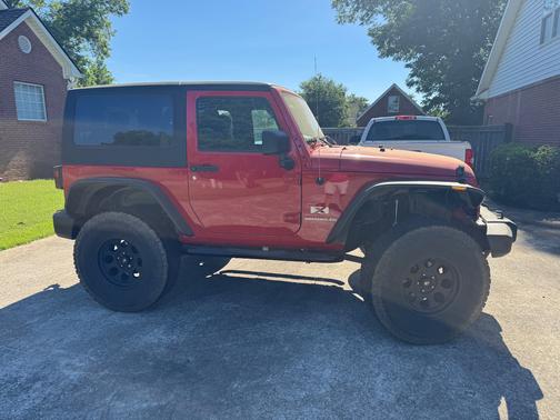 Red 2009 Jeep Wrangler X