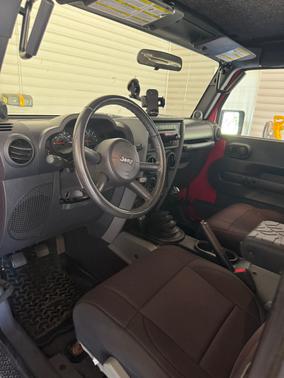 Red 2009 Jeep Wrangler X