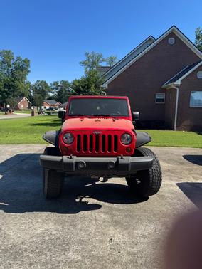 Red 2009 Jeep Wrangler X