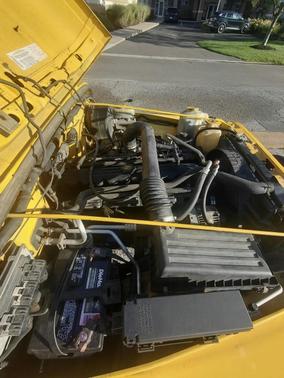 Yellow 2004 Jeep Wrangler Sport
