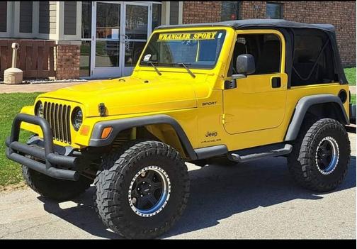 Yellow 2004 Jeep Wrangler Sport