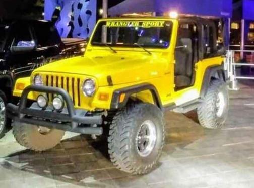 Yellow 2004 Jeep Wrangler Sport