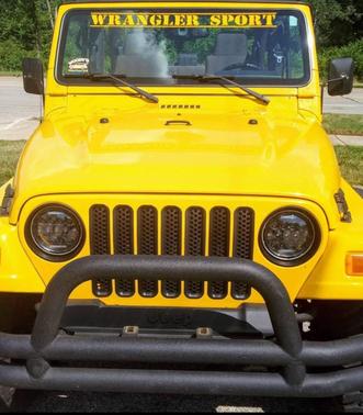 Yellow 2004 Jeep Wrangler Sport