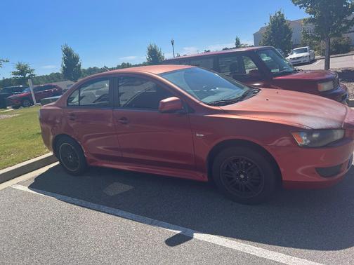 Red 2010 Mitsubishi Lancer ES