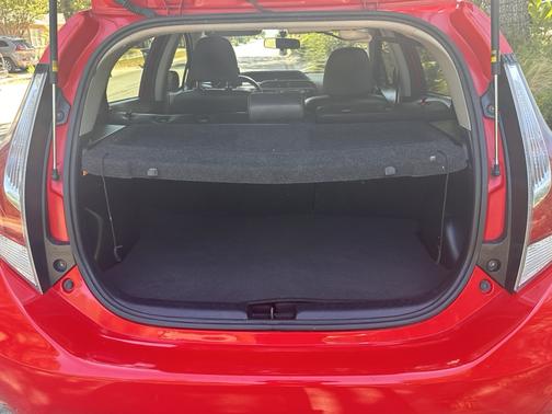 Red 2015 Toyota Prius c Four