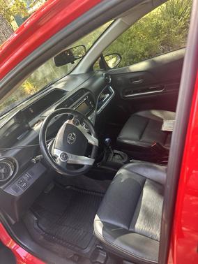 Red 2015 Toyota Prius c Four