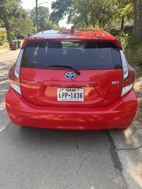 Red 2015 Toyota Prius c Four
