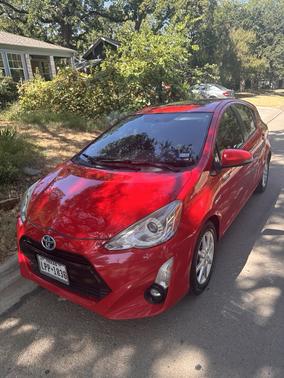 Red 2015 Toyota Prius c Four