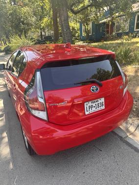 Red 2015 Toyota Prius c Four