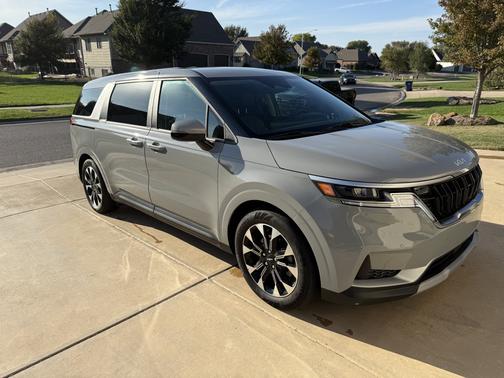 Silver 2024 Kia Carnival EX