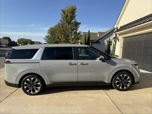 Silver 2024 Kia Carnival EX