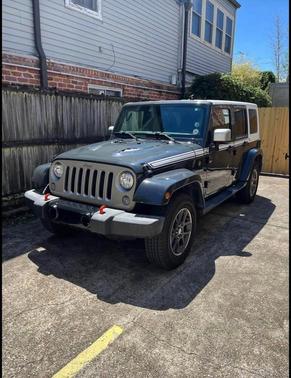 Gray 2017 Jeep Wrangler Unlimited Sahara