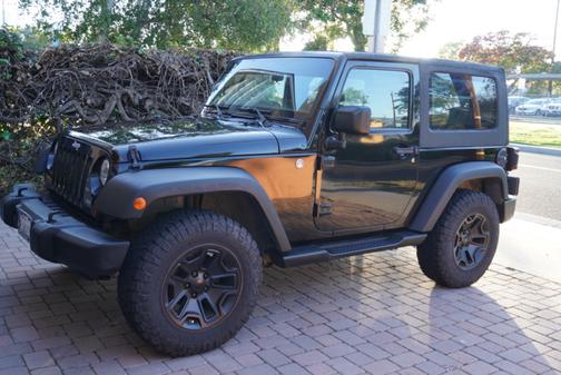 Black 2012 Jeep Wrangler Sport